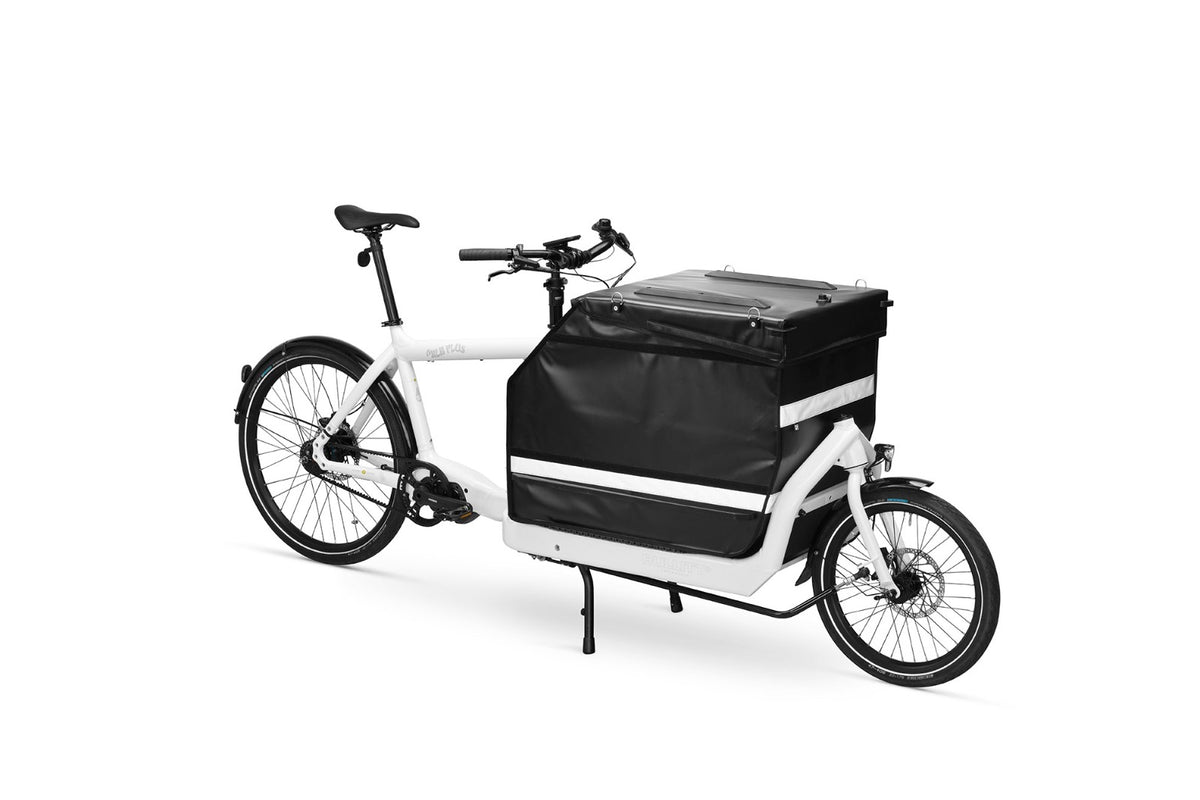 A white eBullitt cargo bike with a lidded black cargo box mounted on the cargo bed.