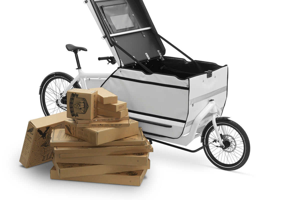 400L BagPRO with an open lid mounted on a Milkplus eBullitt X. Packages infront if the bike