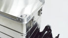 Closeup of the transport box buckles on an aluminium box, mounted on the cargo bed of a Bullitt cargo bike
