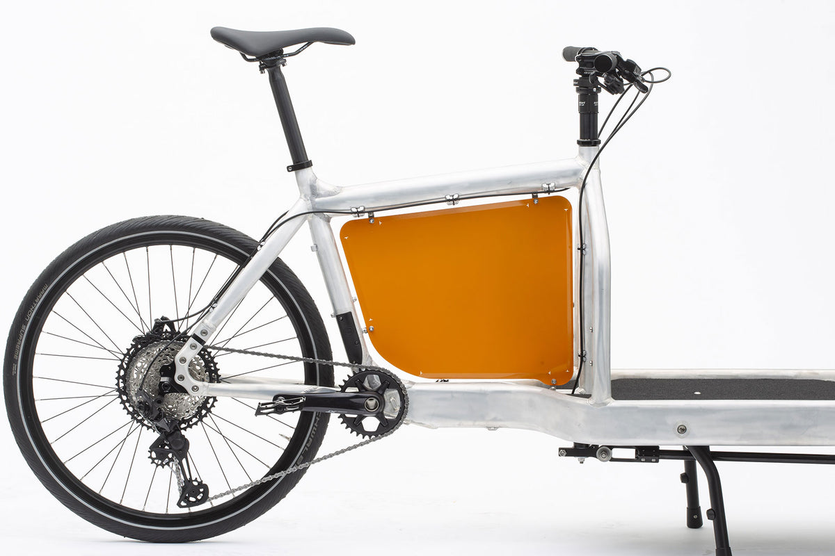 studio picture of an orange billboard for the original Bullitt