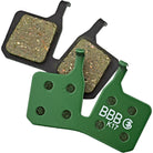 Two brakepads on a white background, one with the backside facing the camera. The backside is green with "BBB" and "K17" printed on it.