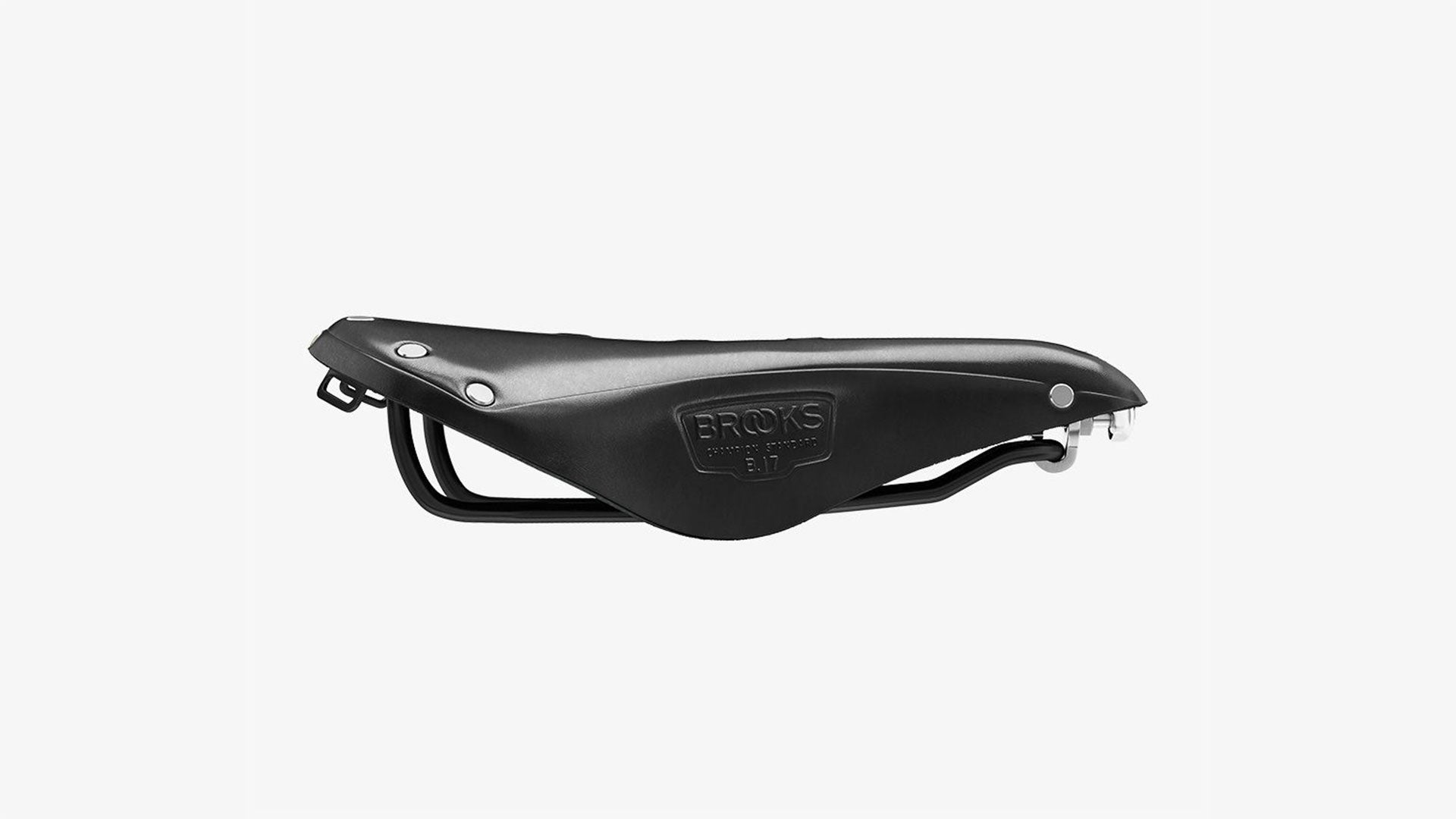 Brooks B17 black saddle seen from the side on a white background