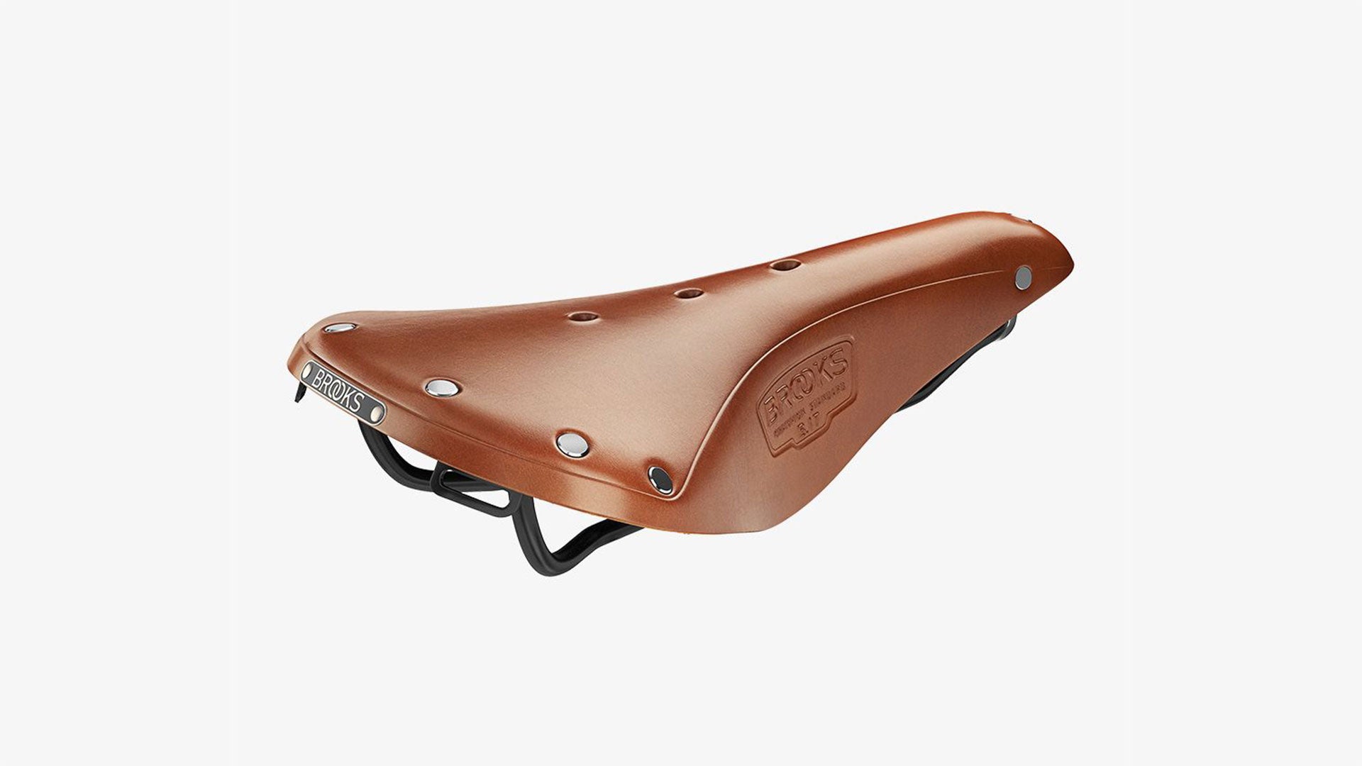 Brooks B17 honey saddle seen from an angle on a white background