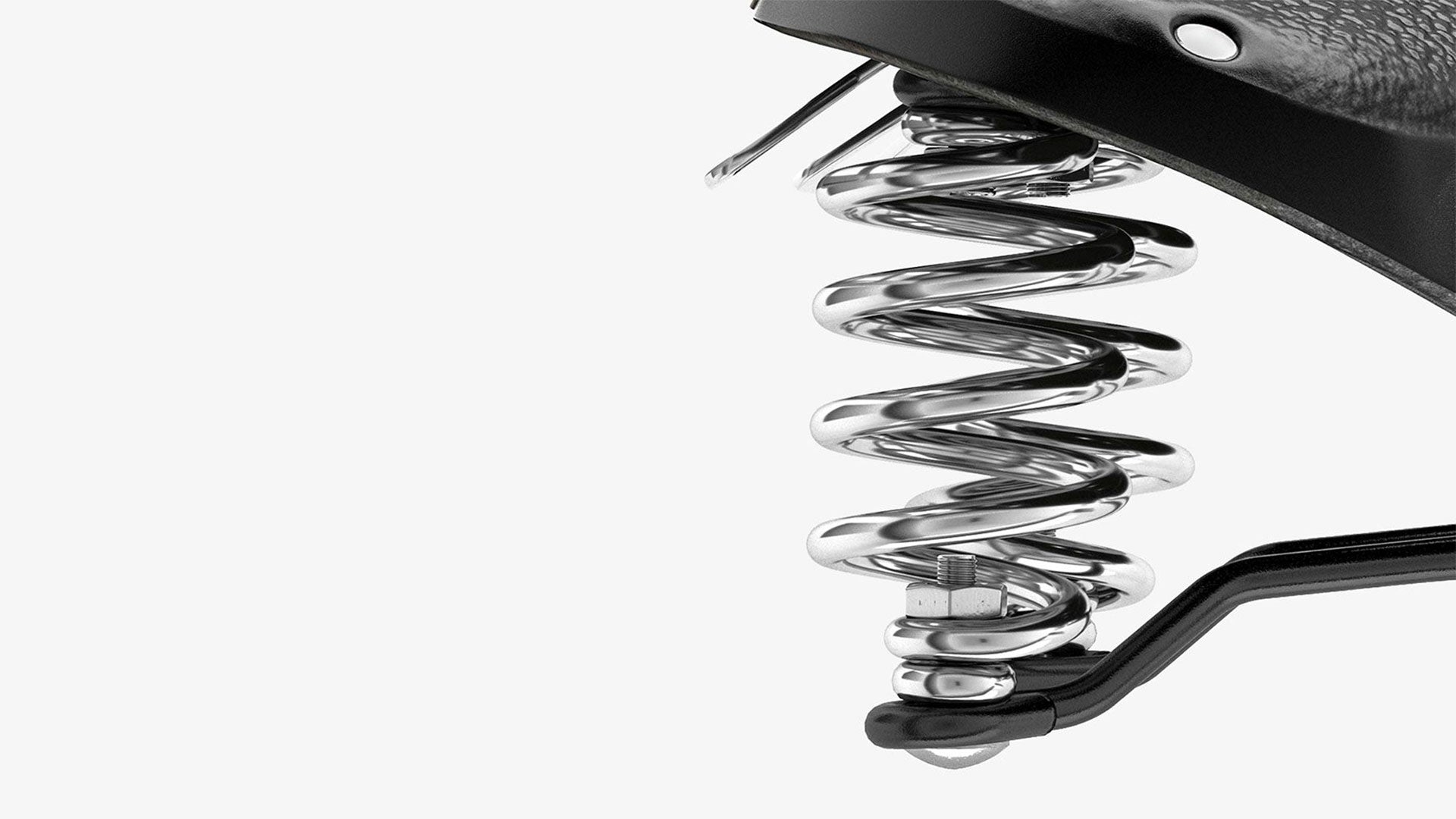 Closeup of suspension springs on Brooks B67 black saddle seen from the side on a white background