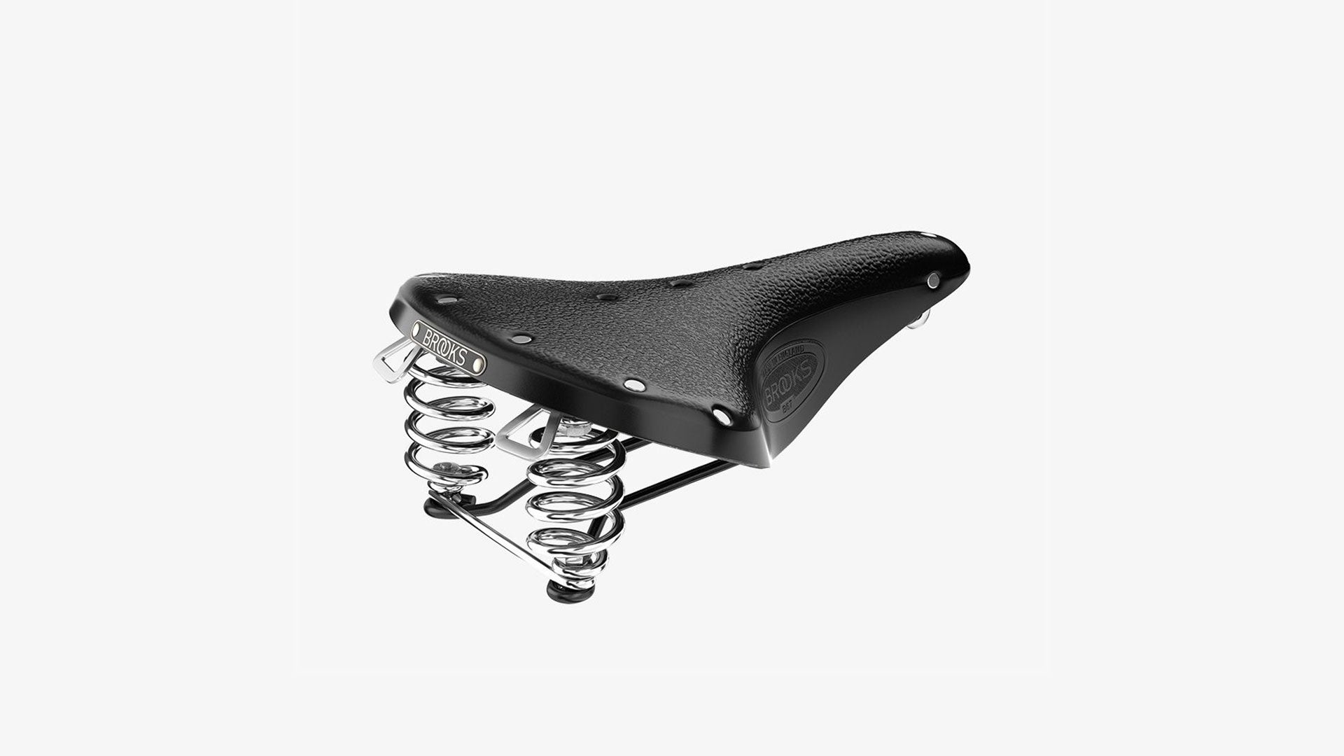 Brooks B67 black saddle seen from an angle on a white background