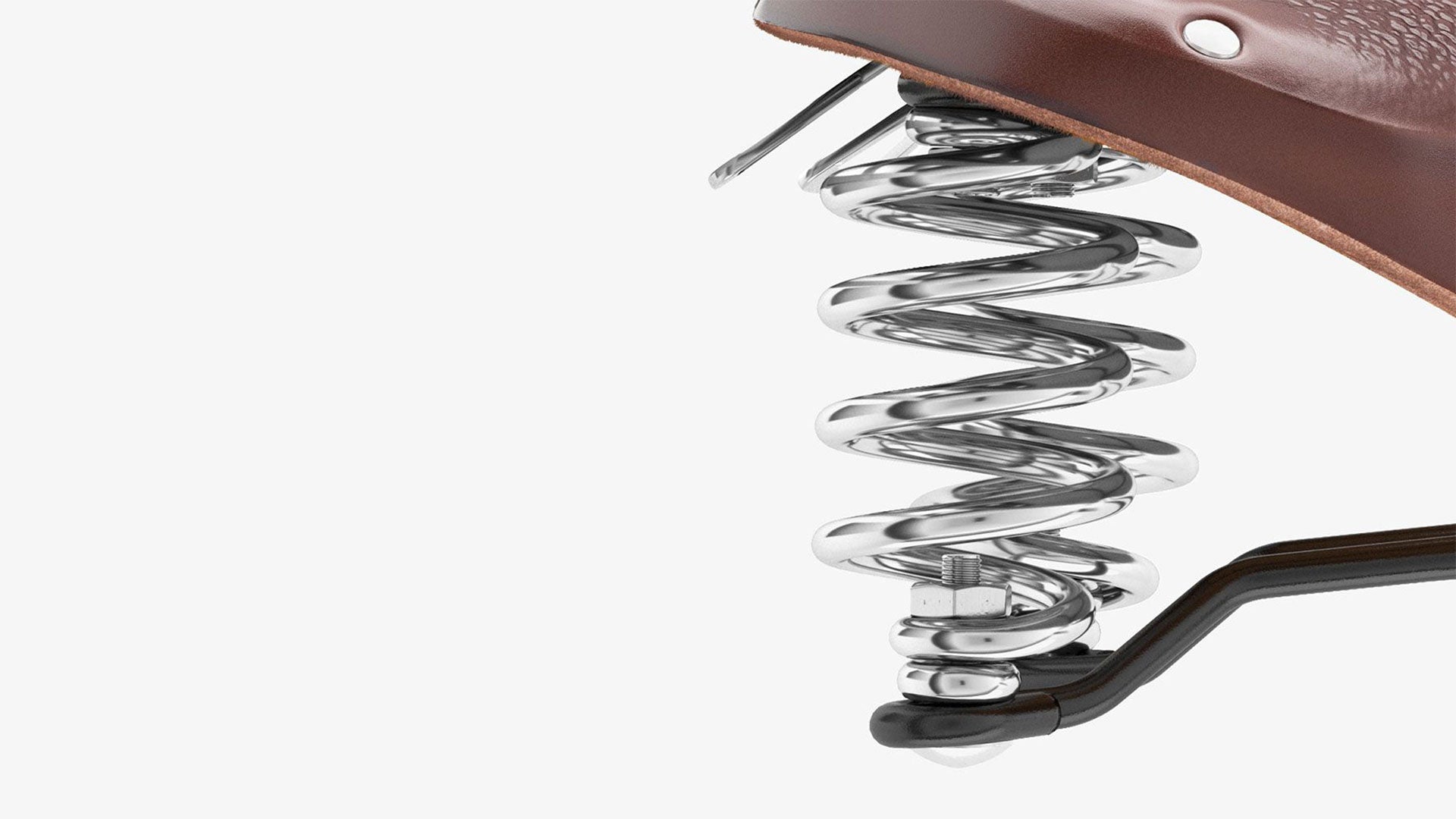 Closeup of suspension springs on Brooks B67 brown saddle seen from the side on a white background