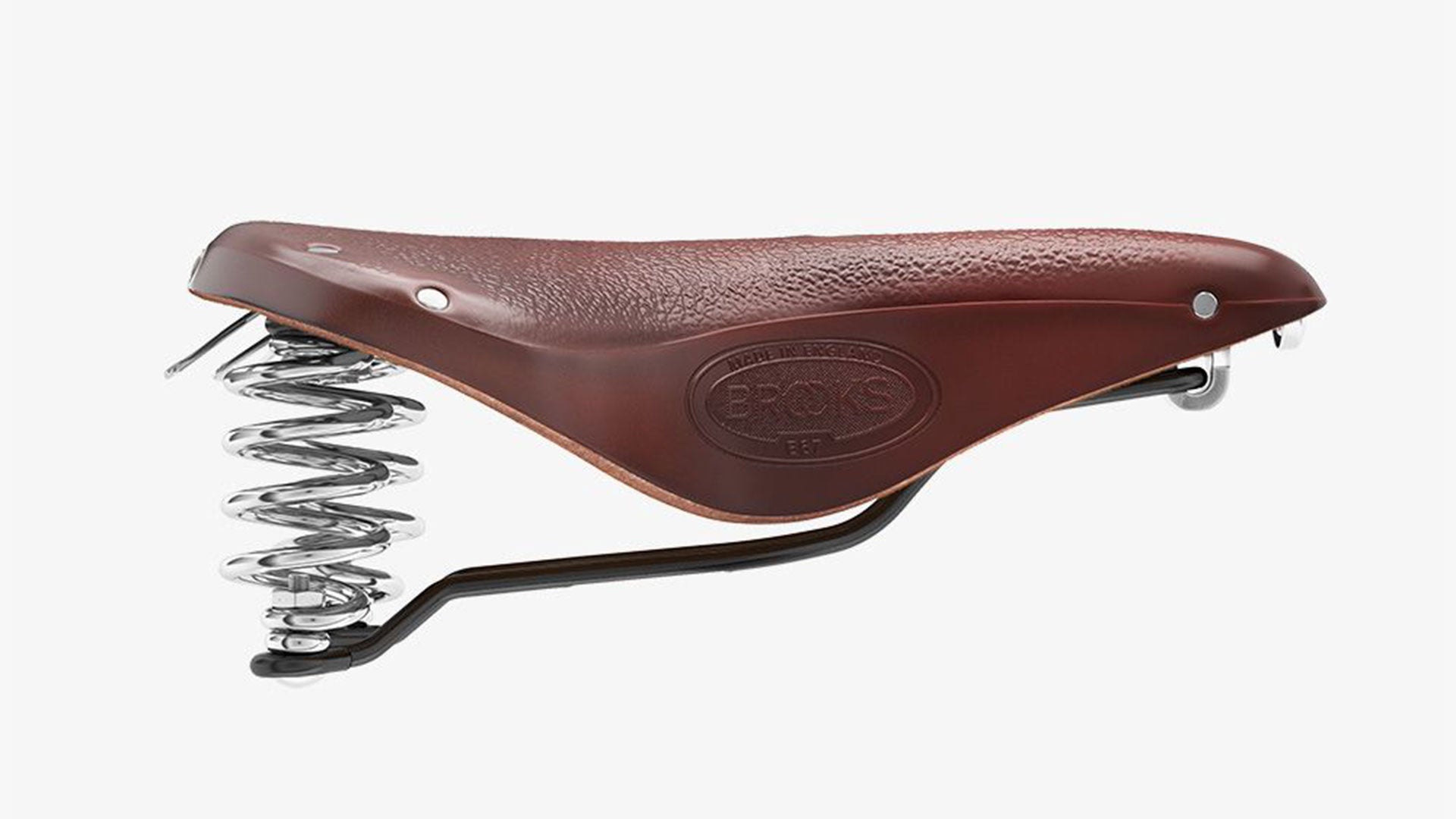 Brooks B67 brown saddle seen from the side on a white background