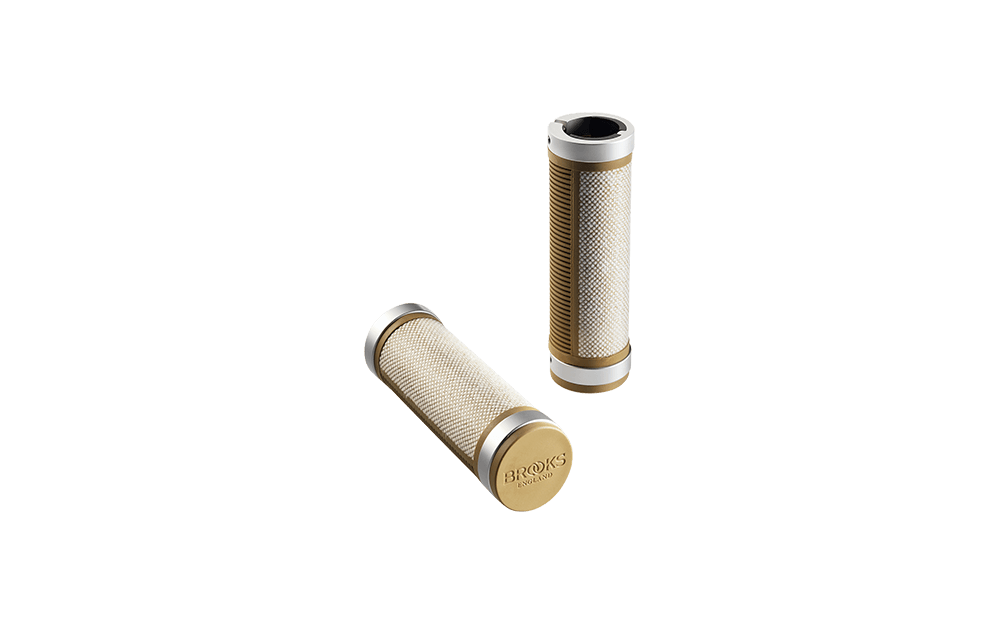 A pair of natural Brooks Cambium grips on a white background