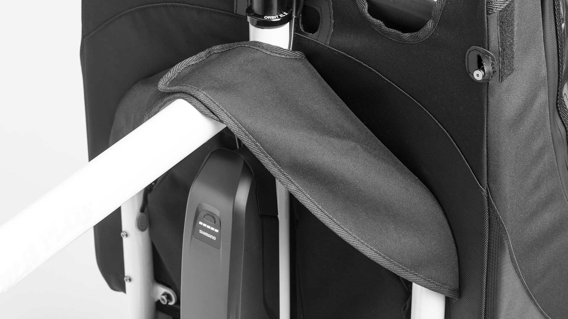 Close up of the velcro strap holding onto the frame of the Bullitt