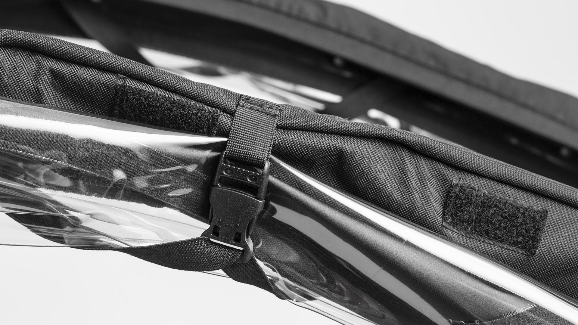 Close up of the straps holder the sidewindow on the Canopy