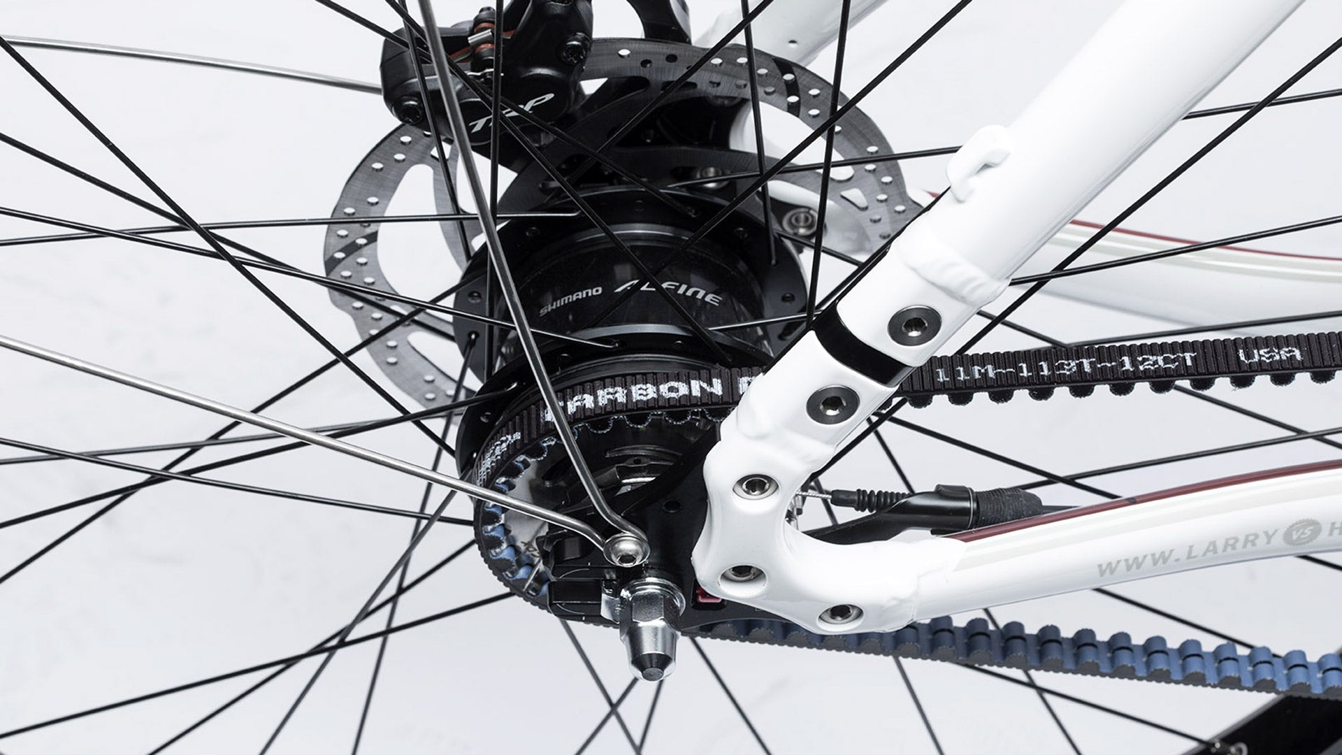 Closeup of a Shimano alfine hub on a Bullitt with the Gates carbon belt installed