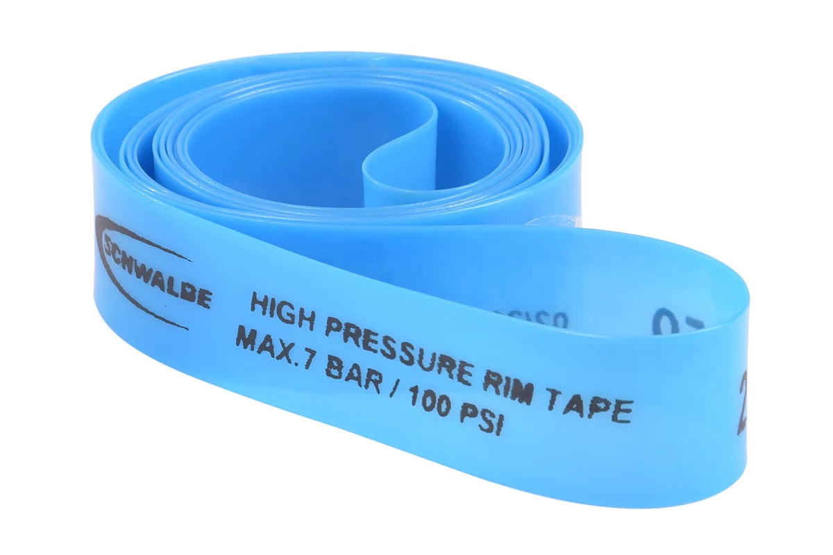 Blue Schwalbe rim tape rolled up, on a white background. Writing on the tape reads "Schwalbe. High pressure rim tape. Max. 7 bar / 100 PSI".