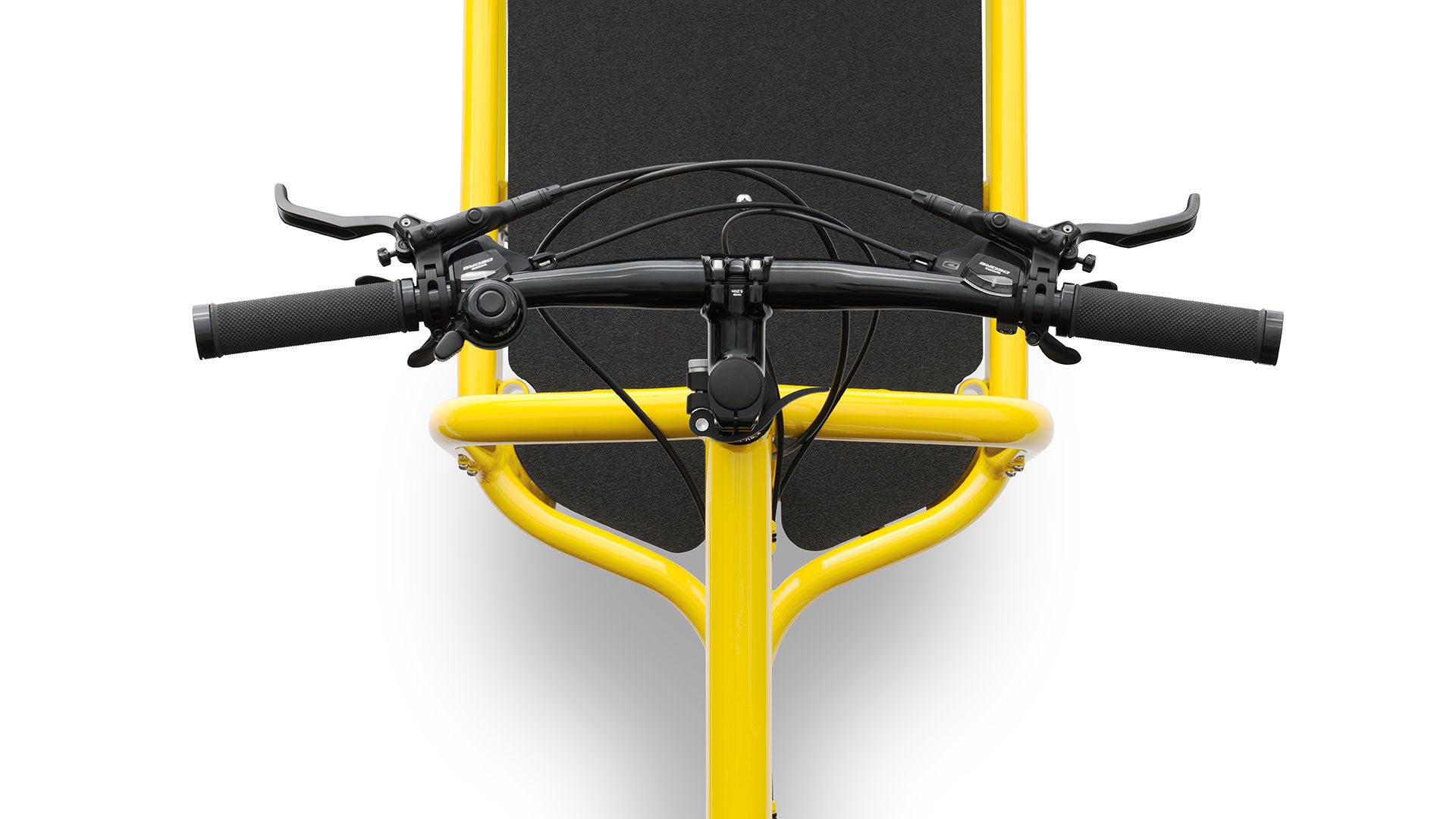 Closeup of the handlebar on a yellow Bullitt, seen from above.