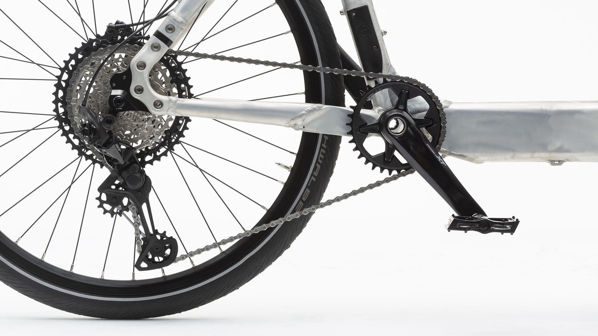 Closeup of the XT 12 speed gear group mounted on a Bullitt. It is external gearing with a single chainring in the front and 12 speed cassette.