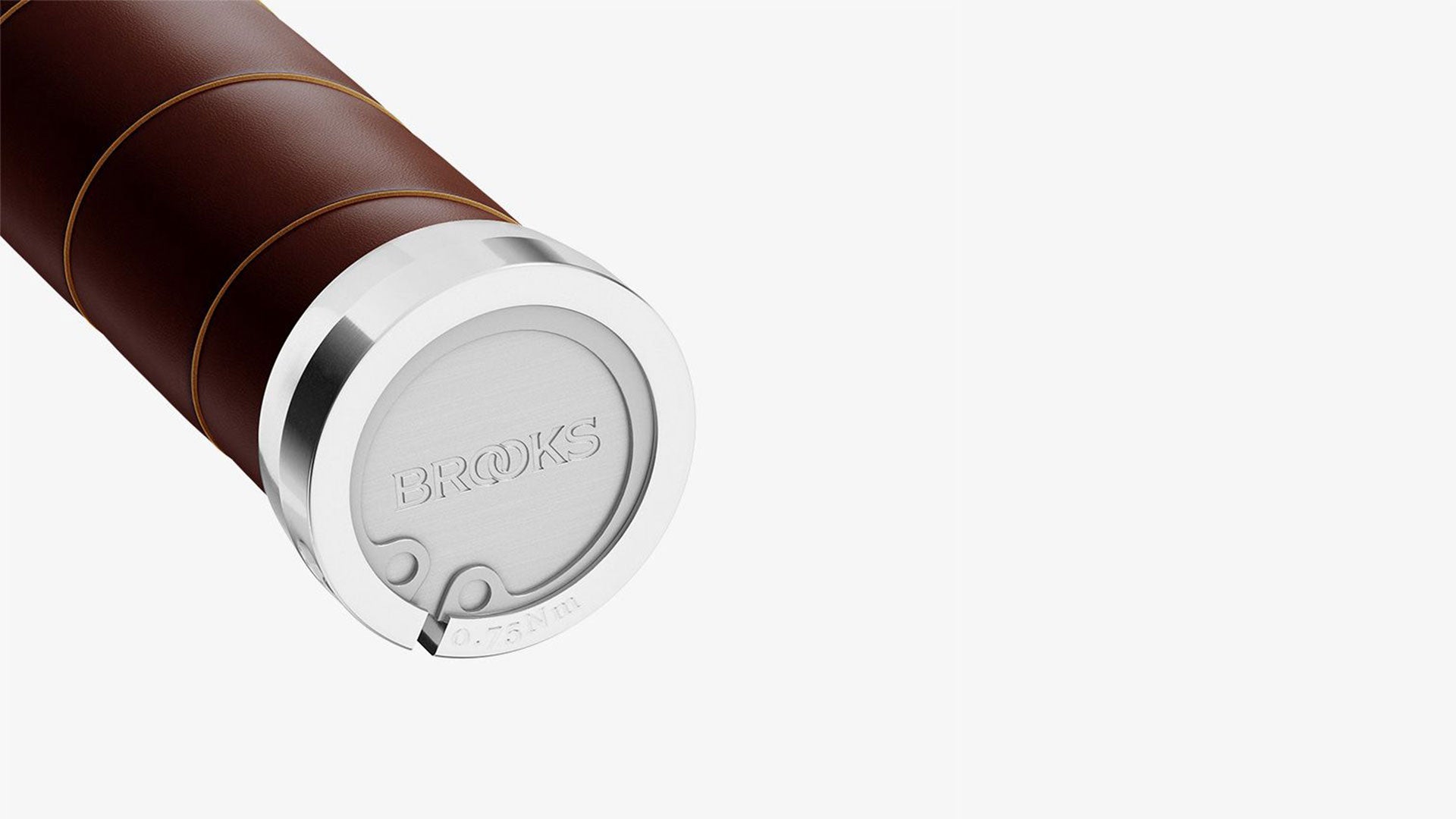 A brown Brooks Slender grip on a white background