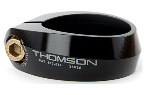 Closeup of a black bolt on type seatclamp. Print on the side reads "Thomson".
