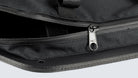 Close up of Fahrer Panel Bags showing a waterproof zipper, half open