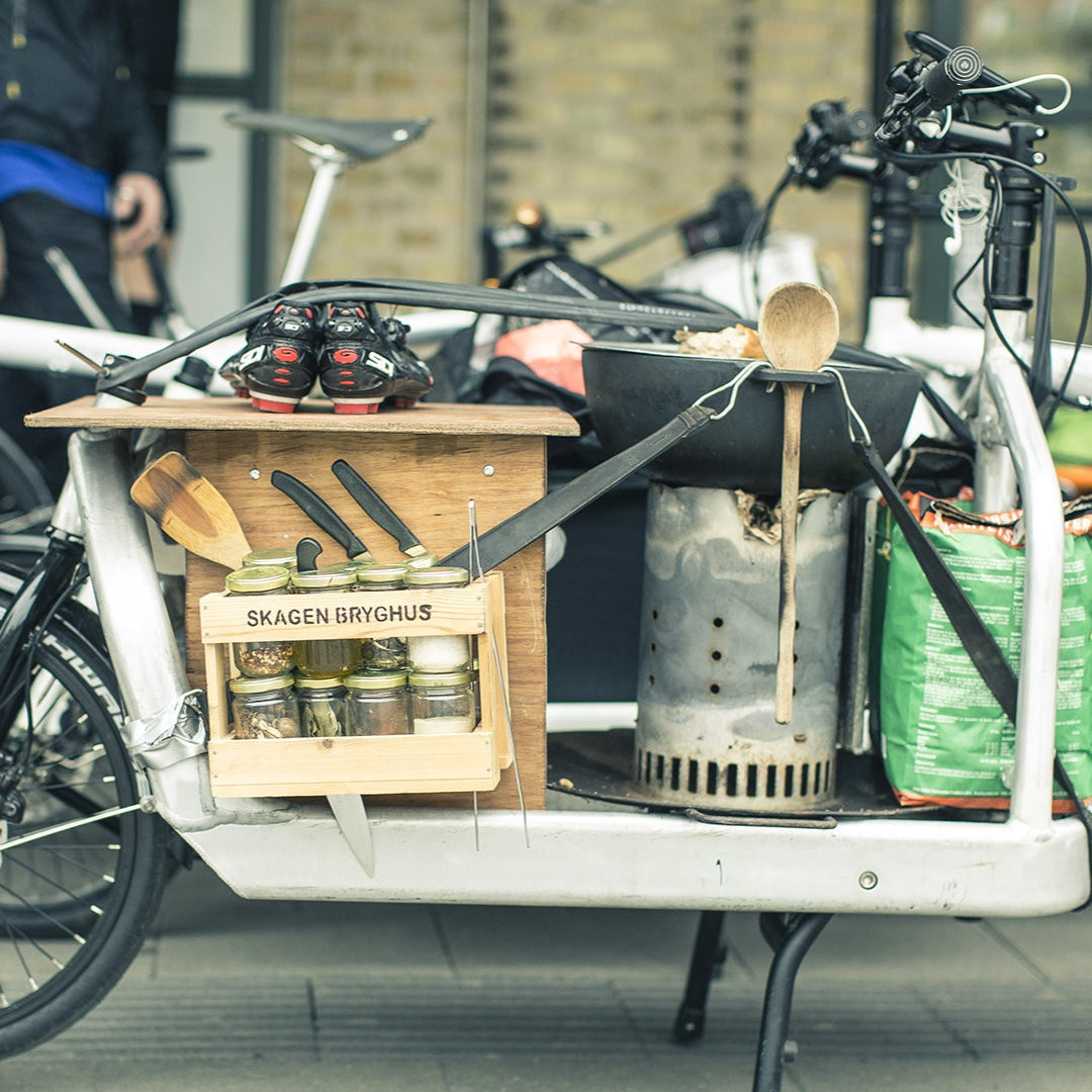 Cool Bullitt cargo bike with cooking equipment for a grill picnic on the cargo bed