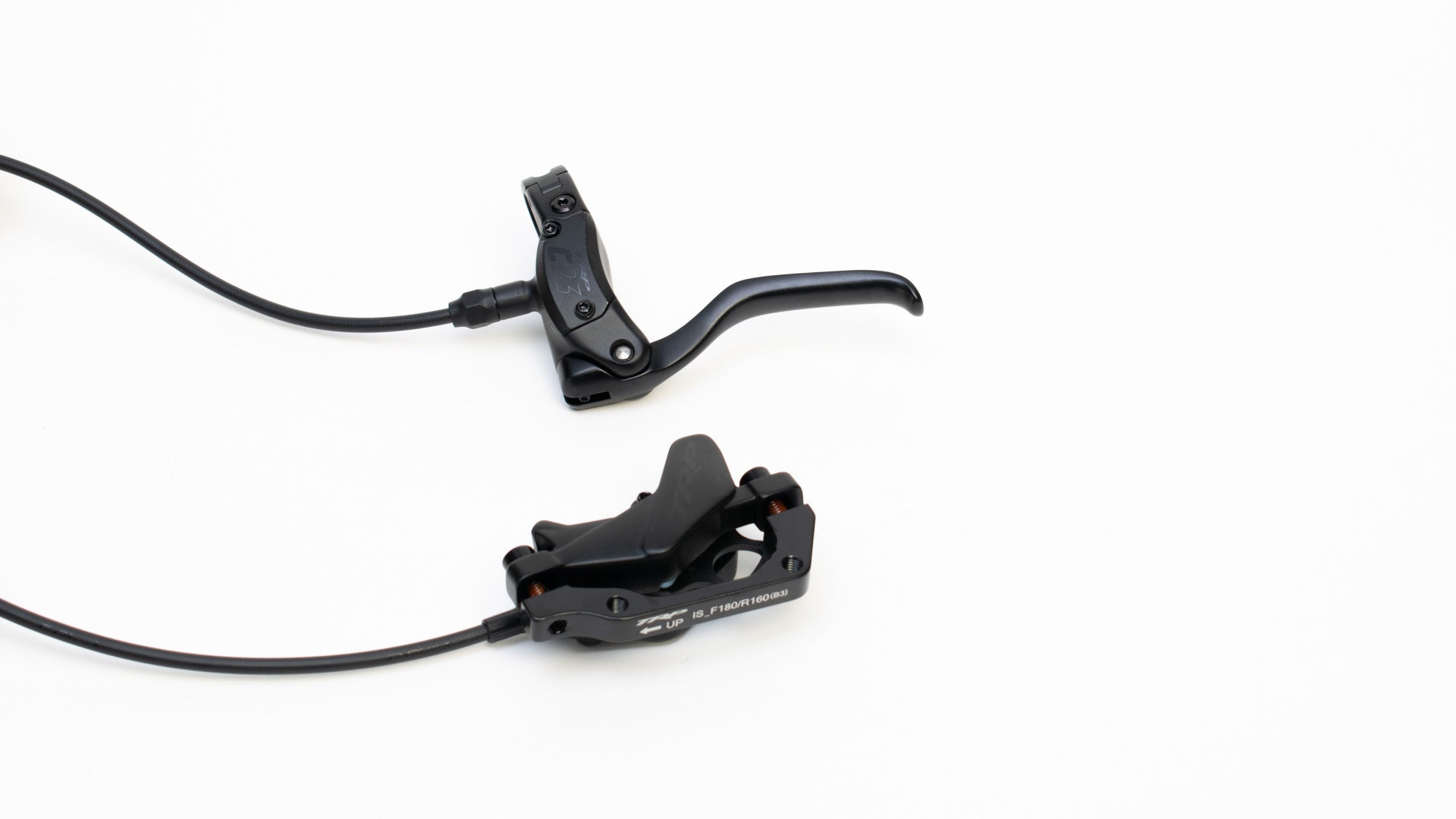 Lever and brake caliper on a white background. TRP C2.3 Front brake.