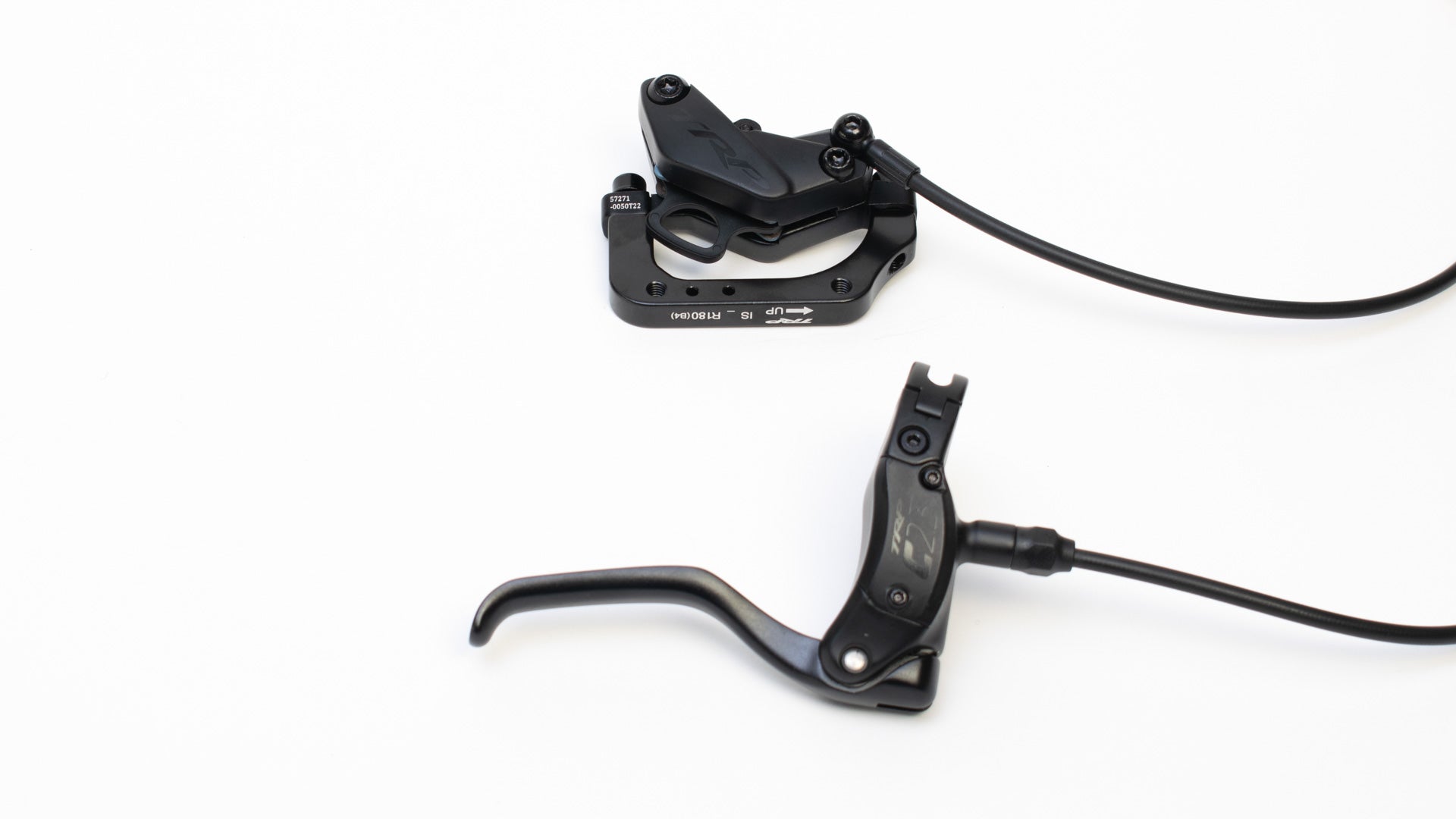 Lever and brake caliper on a white background. TRP C2.3 Rear brake.