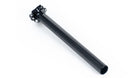 A black seatpost on a white surface