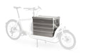 A lidded aluminium transport box mounted on the cargo bed of a Bullitt cargo bike
