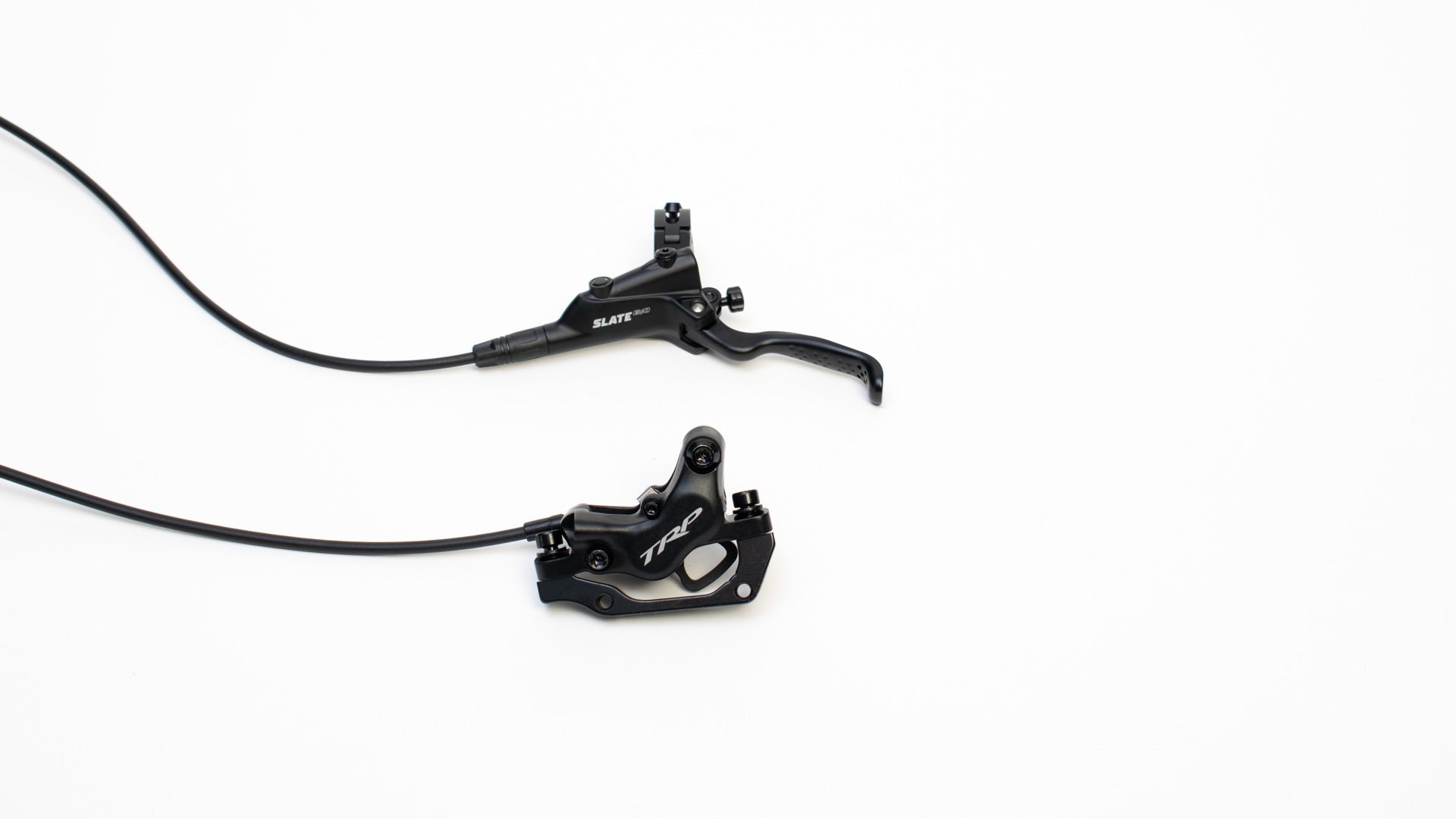 Lever and brake caliper on a white background. TRP Slate EVO Front brake.