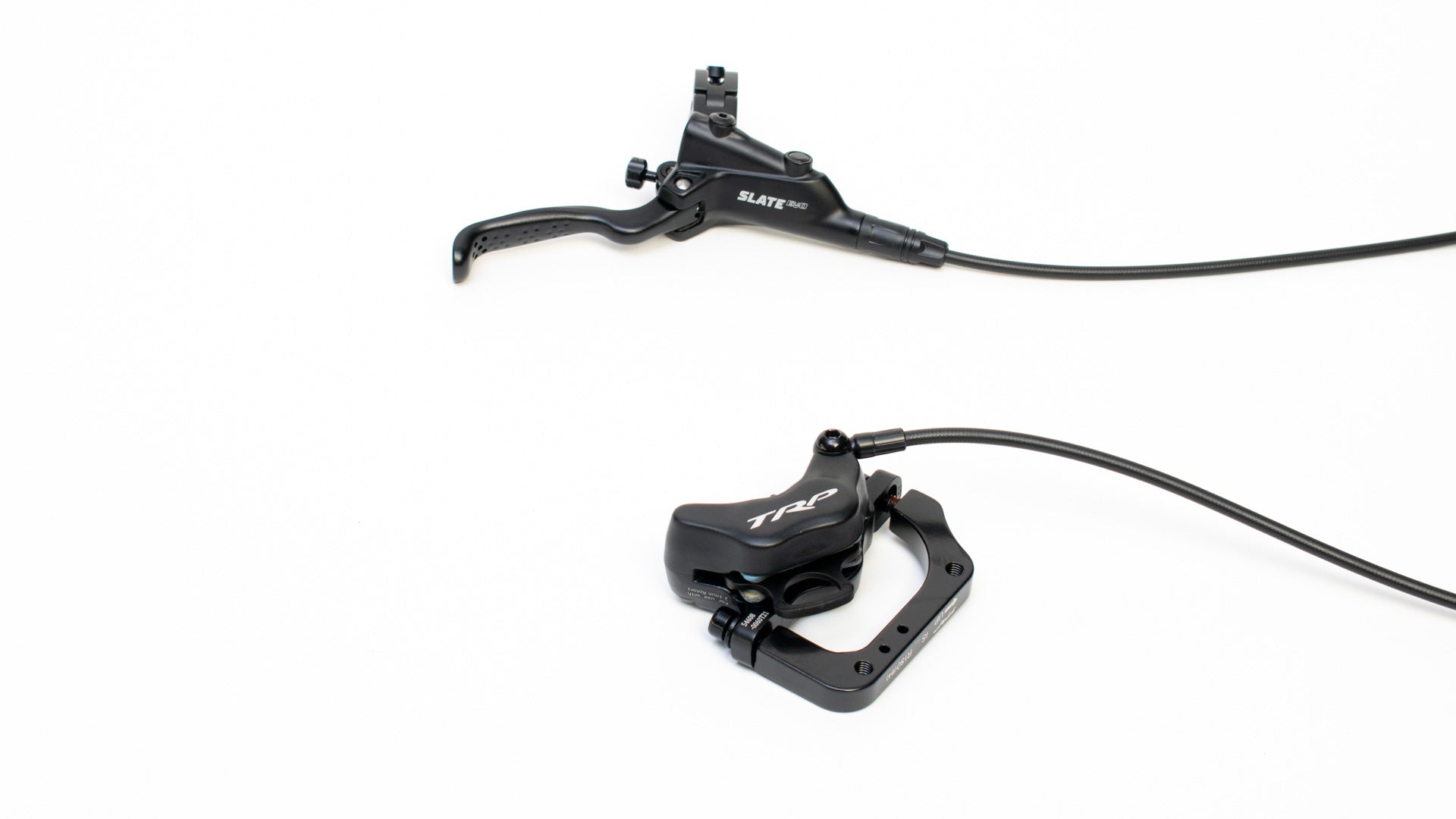 Lever and brake caliper on a white background. TRP Slate EVO Rear brake.