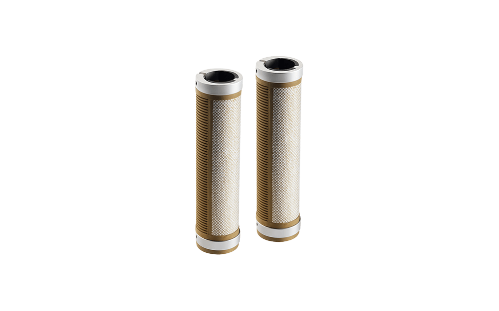 A pair of natural Brooks Cambium grips on a white background