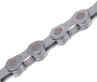 Closeup of KMC chain with the text e11T engraved