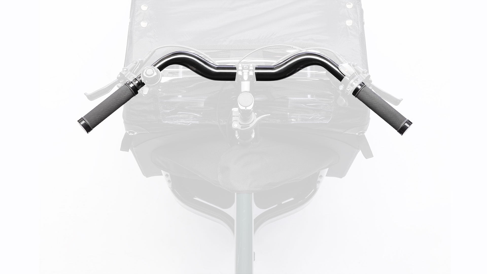 Closeup of the handlebar on a dark green Bullitt cargo bike, seen from above.