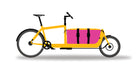 Cargo bag from Dyed in the wool with Pink and yellow panels displayed on a yellow bullitt