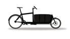 Cargo bag from Dyed in the wool with black panels displayed on a black bullitt