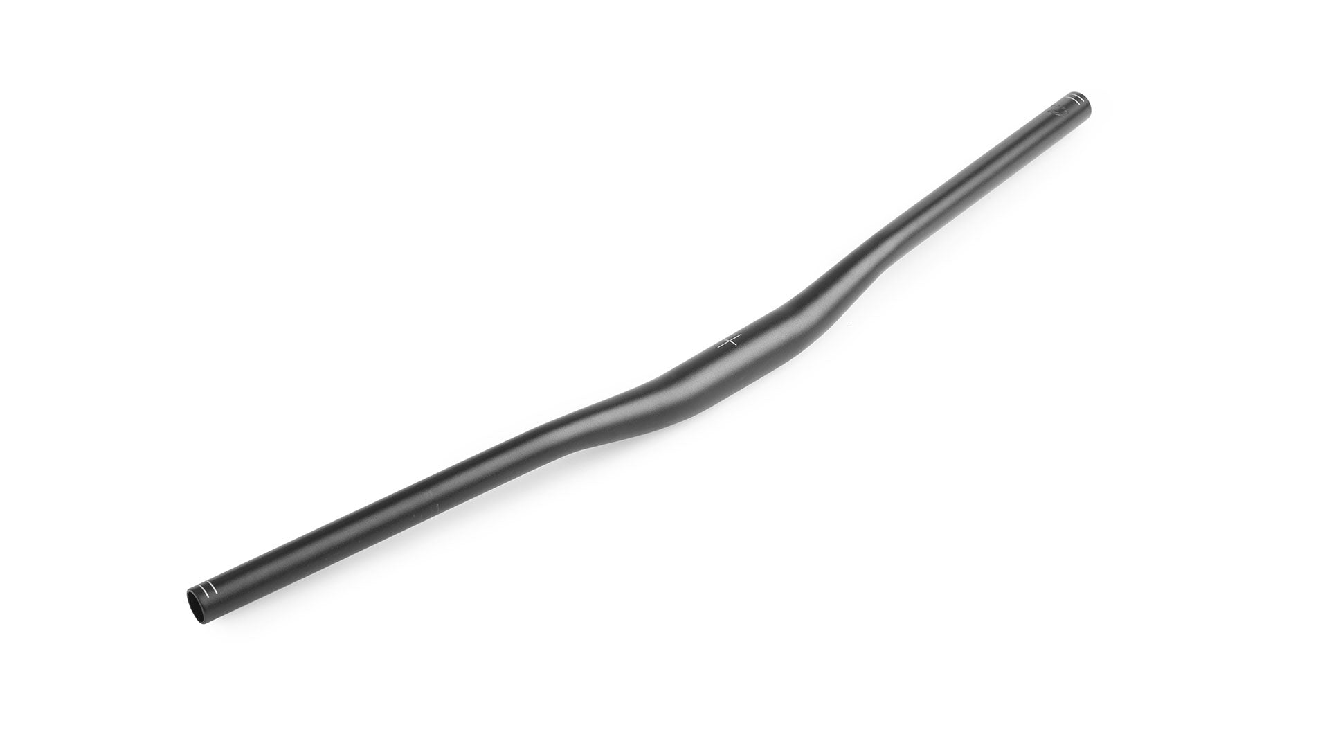 A wide black handlebar with very little rise lying on a white surface