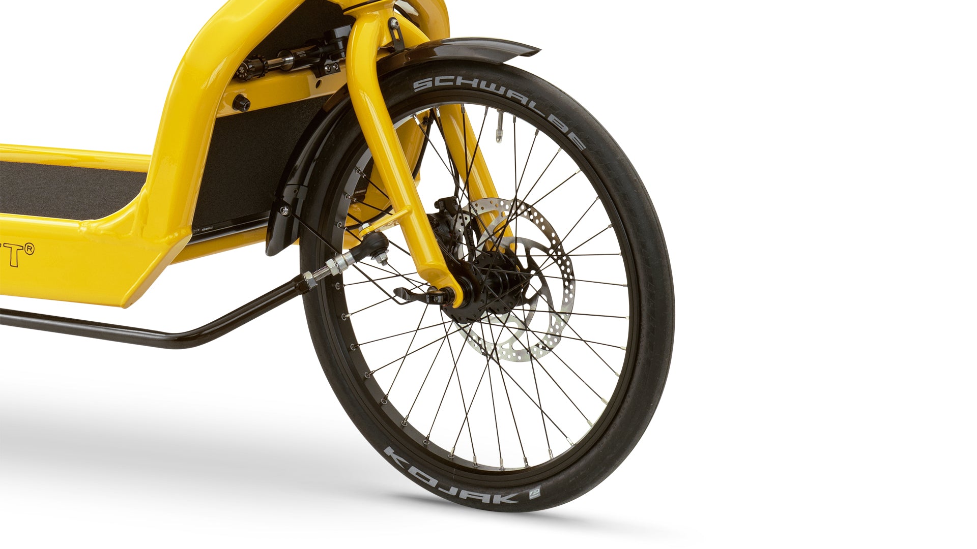 Closeup of a yellow Bullitt cargo bike, front wheel mounted with a Schwalbe Kojak tyre.