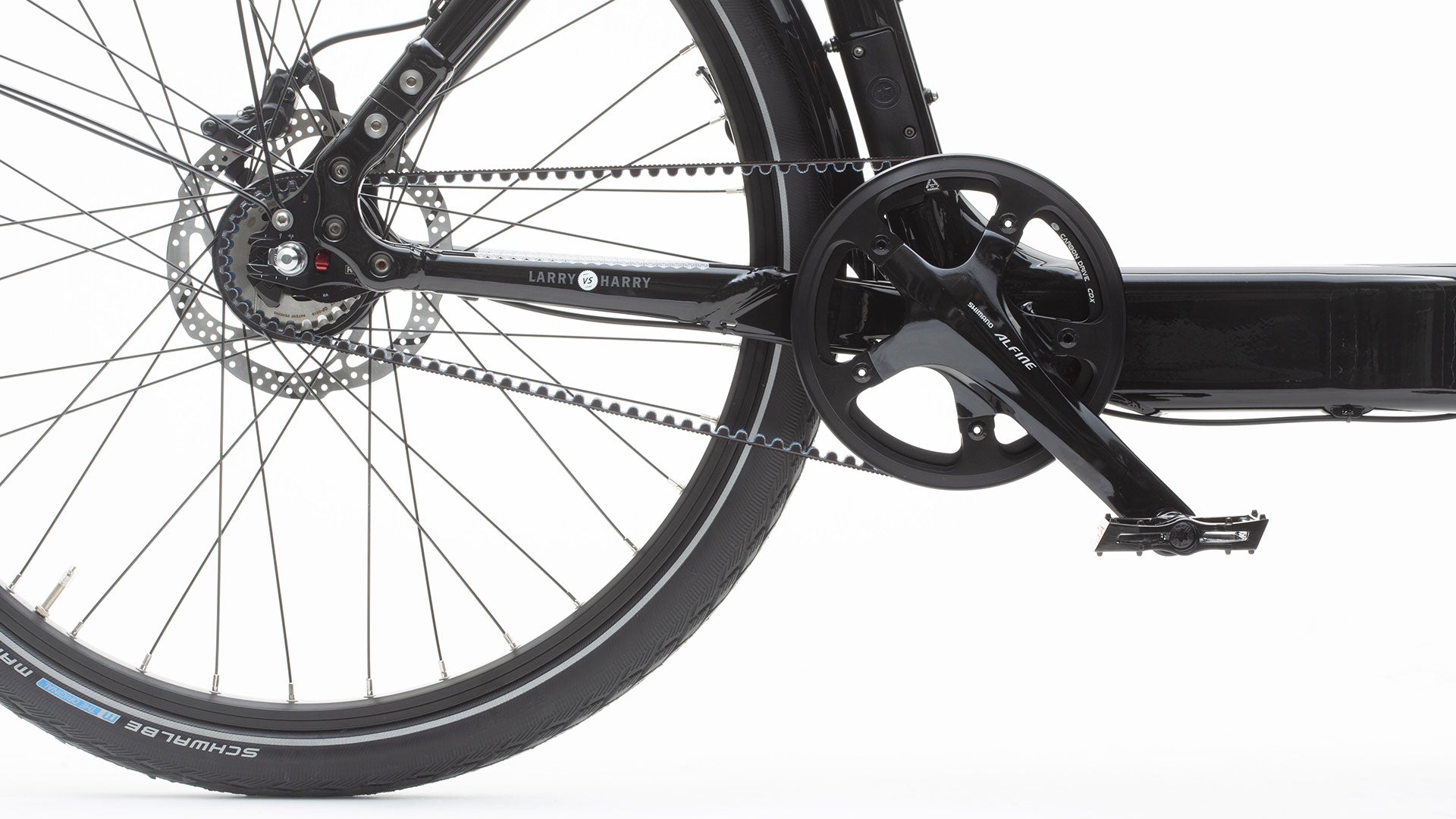 Closeup of the drivetrain on a pedal-powered Bullitt cargo bike with internal gears and Gates carbon belt