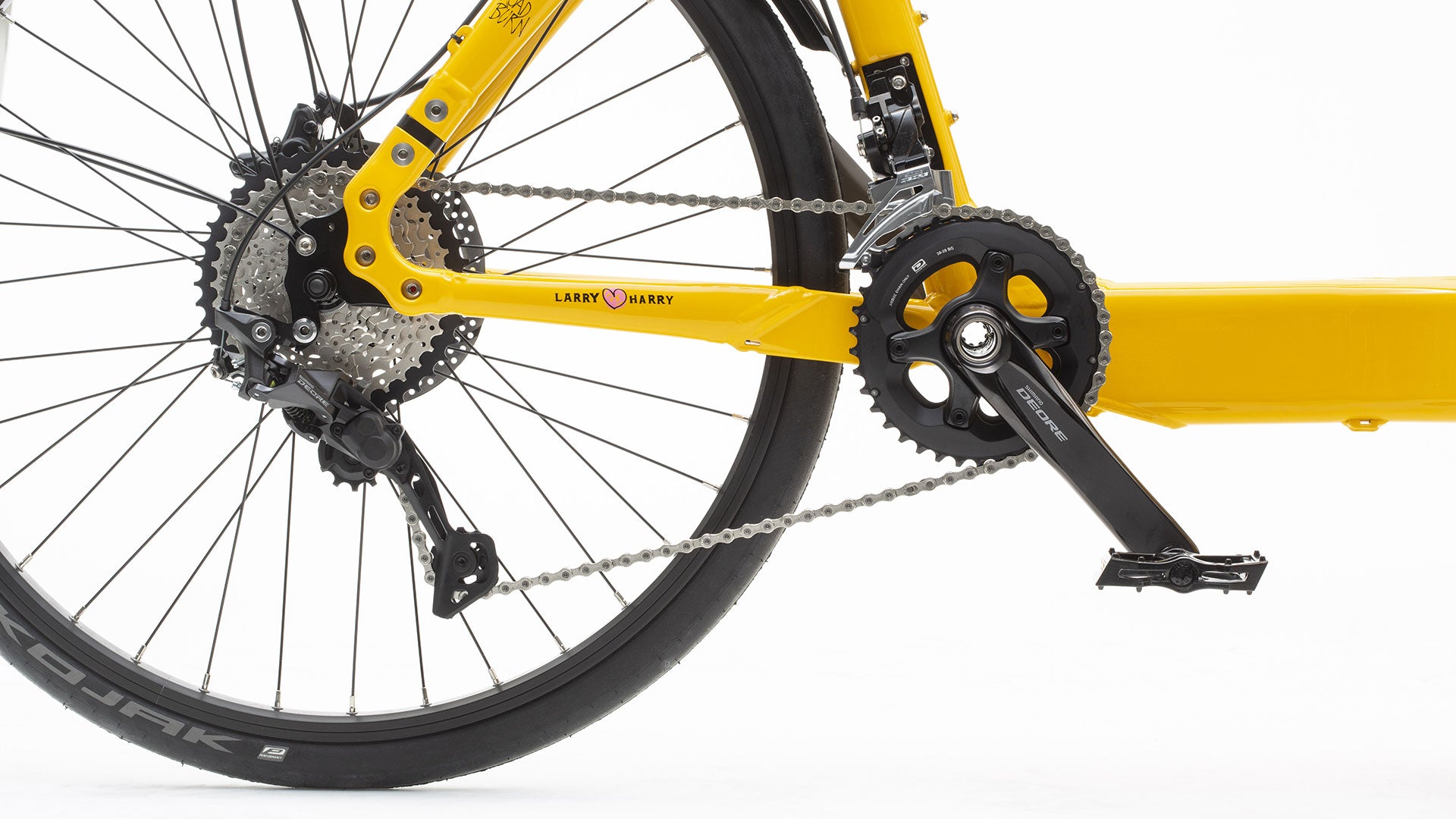 Closeup of the Deore 20 speed gear group mounted on a Bullitt. It is external gearing with front derailleur. Two chainrings in the front and 10 speed cassette.
