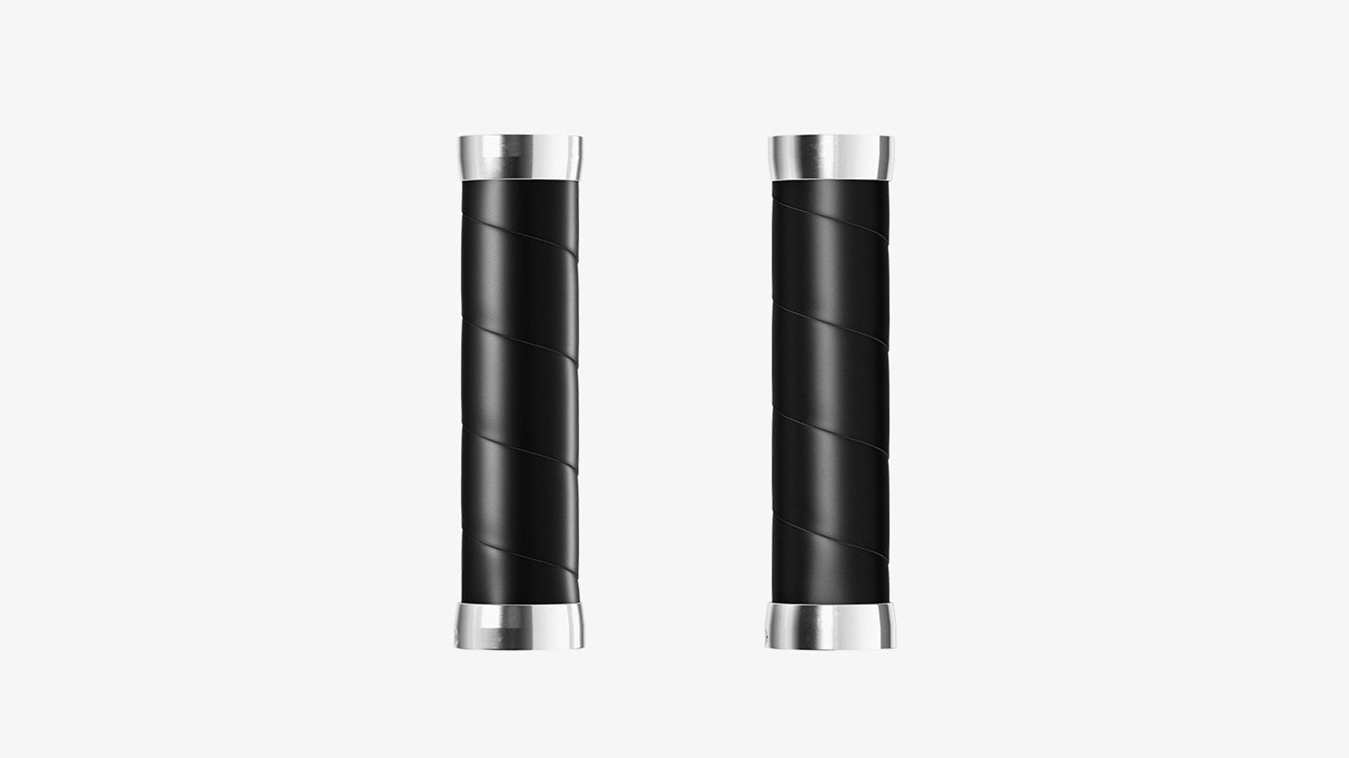 A pair of black Brooks Slender grips on a white background
