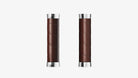 A pair of brown Brooks Slender grips on a white background
